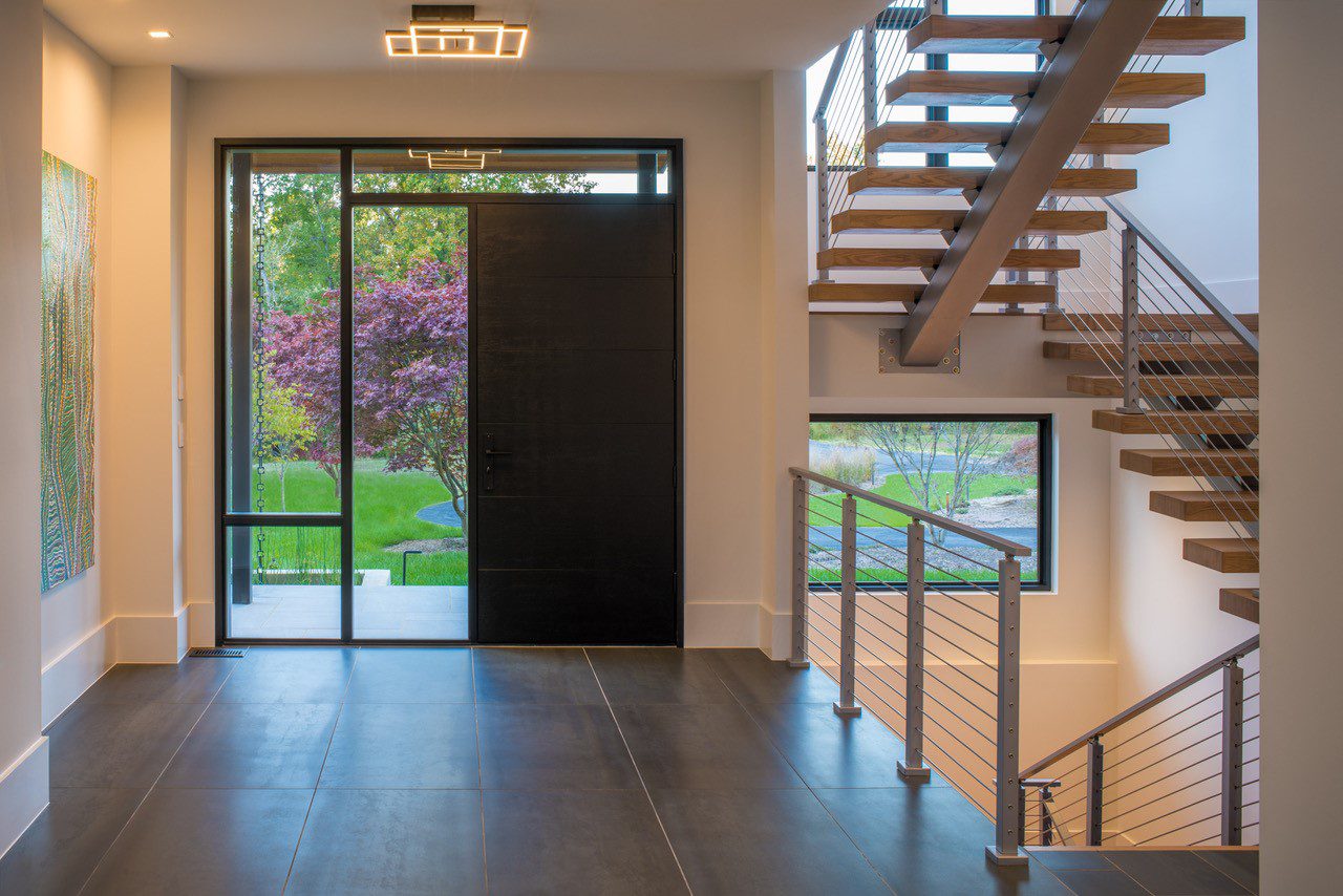 Modern Foyer with Floating Stairs